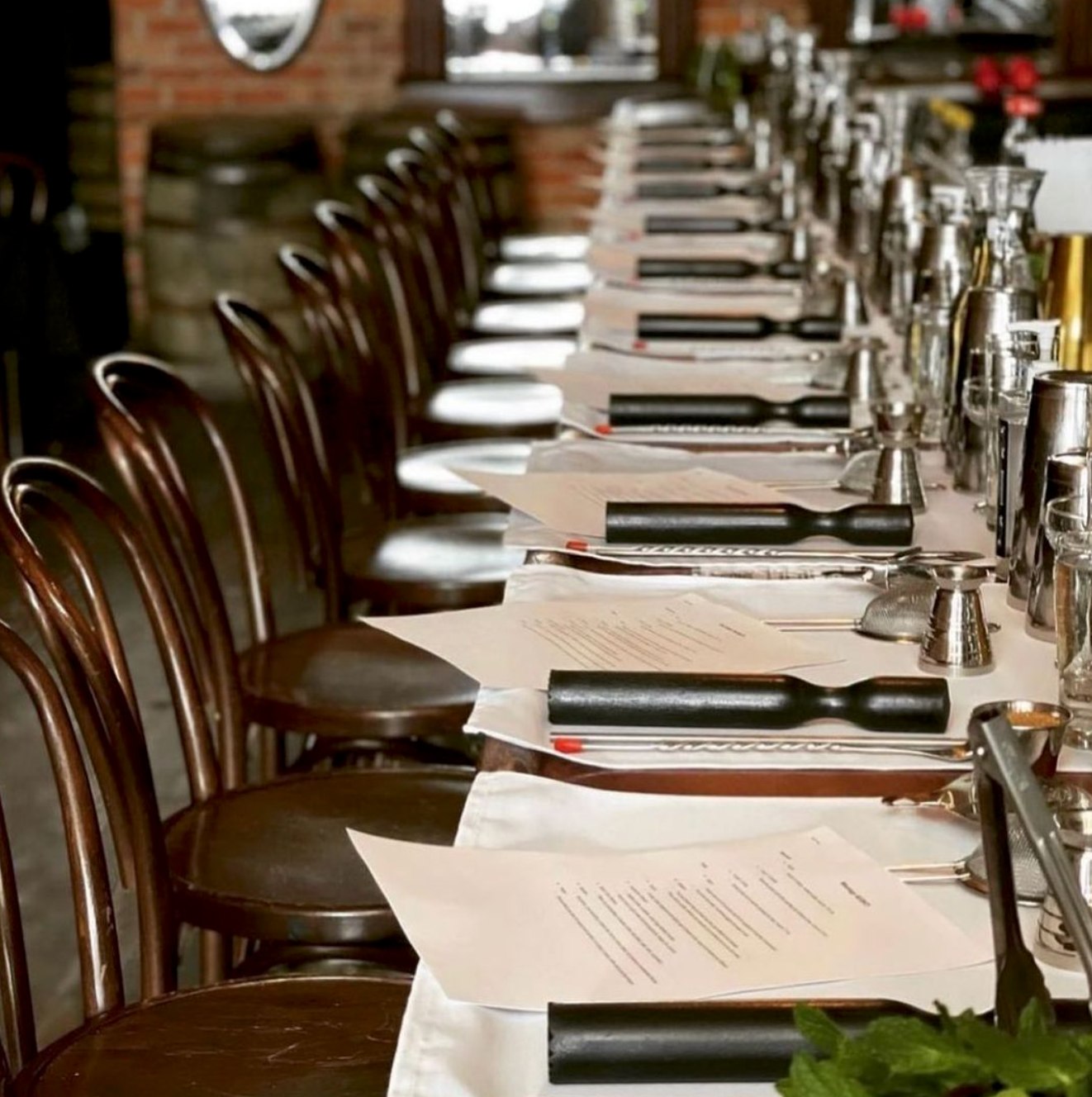 Sugar House private class setup with cocktail tools and recipe cards